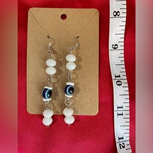 Mixed media evil eye dangle earrings